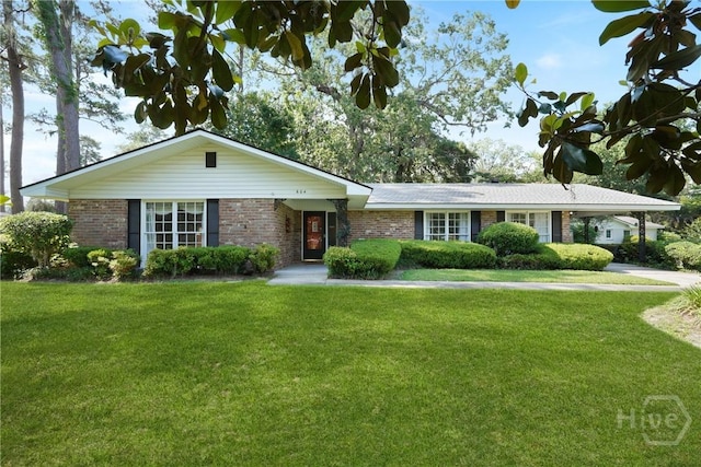604 Windsor Rd, Savannah, GA 31419 - ranch-style home with brick siding and a front yard