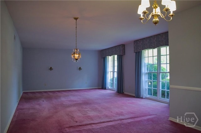 604 Windsor Rd, Savannah, GA 31419 - carpeted empty room with a chandelier and baseboards