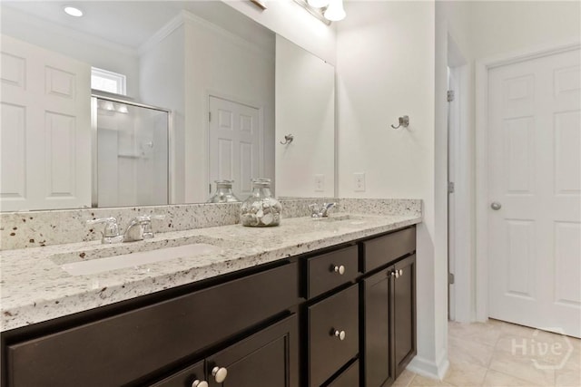 402 Southwilde Way, Pooler, GA 31322 - full bathroom featuring crown molding, double vanity, a stall shower, and tile patterned floors