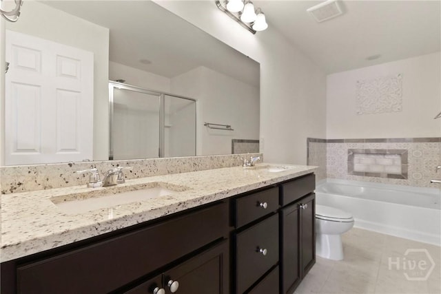 402 Southwilde Way, Pooler, GA 31322 - full bath featuring a stall shower, tile patterned floors, double vanity, a garden tub, and toilet