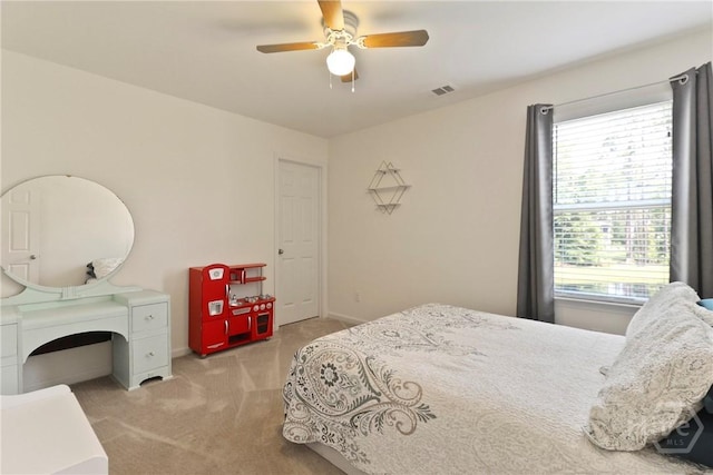 402 Southwilde Way, Pooler, GA 31322 - carpeted bedroom featuring multiple windows, ceiling fan, and baseboards