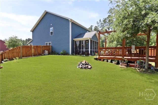 402 Southwilde Way, Pooler, GA 31322 - back of property featuring a sunroom, a fire pit, and a deck