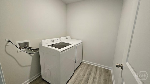 156 Kraft, Pooler, GA 31322 - laundry room with separate washer and dryer, light wood-style flooring, and baseboards