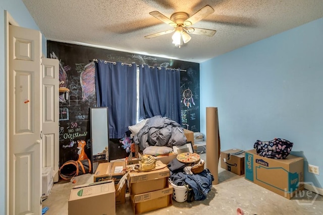 510 Mallory Rd, Reidsville, GA 30453 - bedroom with a textured ceiling, unfinished concrete floors, and ceiling fan