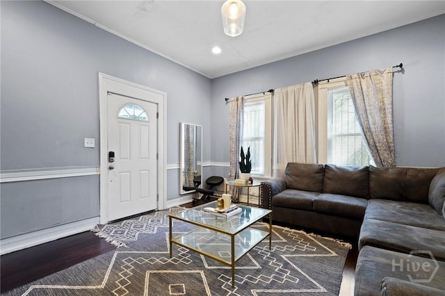 514 W 38th St, Savannah, GA 31415 - living area with healthy amount of natural light, wood finished floors, and ornamental molding