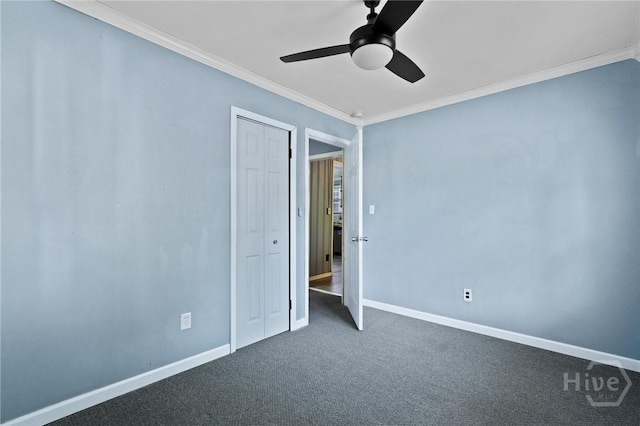 514 W 38th St, Savannah, GA 31415 - unfurnished bedroom with ornamental molding, baseboards, carpet flooring, a closet, and a ceiling fan