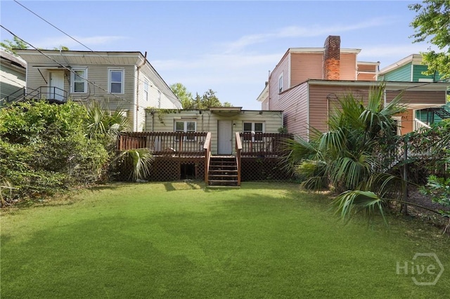 514 W 38th St, Savannah, GA 31415 - rear view of property with a yard, a chimney, and a deck