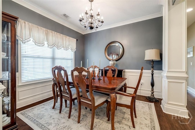 109 Oaklawn Dr, Rincon, GA 31326 - dining area with a chandelier, ornamental molding, dark wood-style flooring, and a wainscoted wall