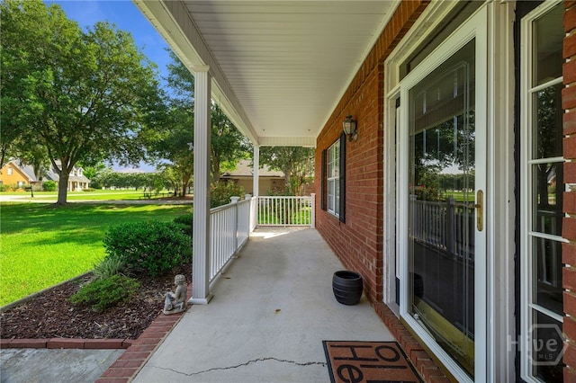 209 Saint James Walk, Guyton, GA 31312 - porch featuring a yard