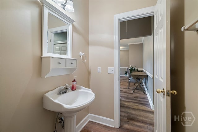 209 Saint James Walk, Guyton, GA 31312 - bathroom with wood finished floors and baseboards