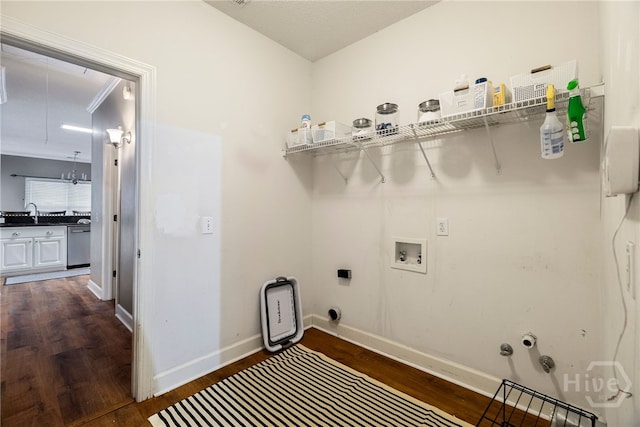 209 Saint James Walk, Guyton, GA 31312 - laundry room featuring washer hookup, hookup for an electric dryer, dark wood-style flooring, attic access, and gas dryer hookup