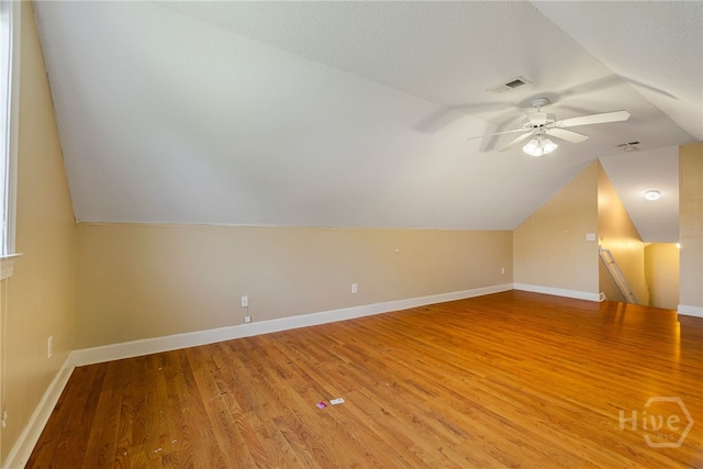 209 Saint James Walk, Guyton, GA 31312 - bonus room featuring a ceiling fan, lofted ceiling, light wood-style flooring, and baseboards