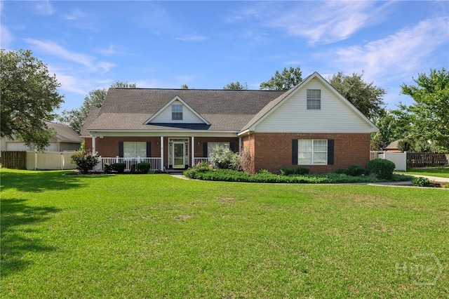 209 Saint James Walk, Guyton, GA 31312 - traditional home featuring brick siding and a porch