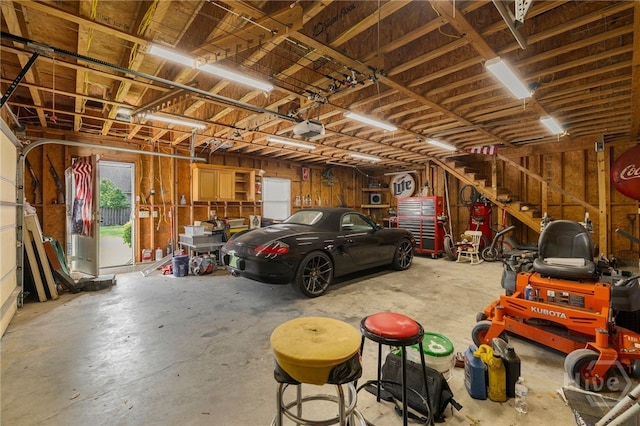 209 Saint James Walk, Guyton, GA 31312 - garage with a garage door opener