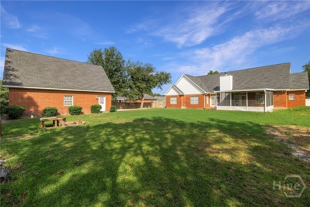 209 Saint James Walk, Guyton, GA 31312 - view of yard featuring a sunroom