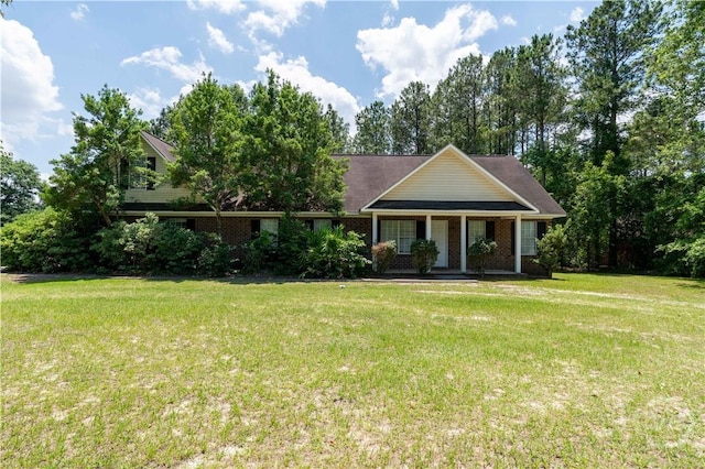 812 King Arthur Dr, Statesboro, GA 30458 - view of front facade featuring a porch, a front yard, and brick siding