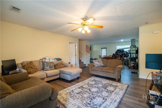 812 King Arthur Dr, Statesboro, GA 30458 - living room with stairway, ceiling fan, wood finished floors, and baseboards