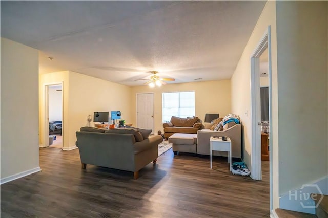 812 King Arthur Dr, Statesboro, GA 30458 - living room with ceiling fan, dark wood-style flooring, and baseboards
