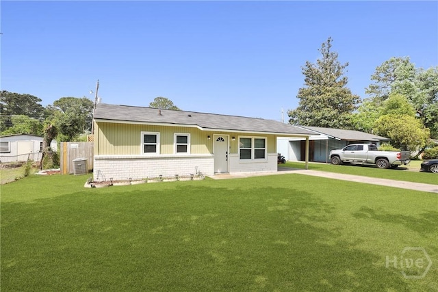 1504 Audubon Dr, Savannah, GA 31415 - ranch-style home with central air condition unit, a carport, brick siding, and driveway
