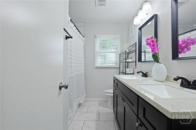 1504 Audubon Dr, Savannah, GA 31415 - bathroom featuring marble finish flooring, double vanity, toilet, baseboards, and a shower with curtain