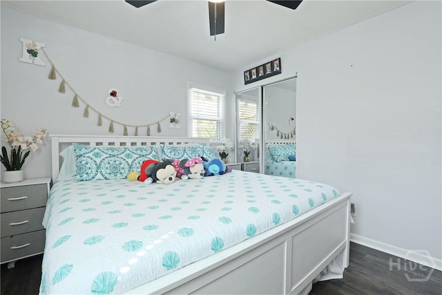 1504 Audubon Dr, Savannah, GA 31415 - bedroom featuring a closet, dark wood finished floors, baseboards, and a ceiling fan
