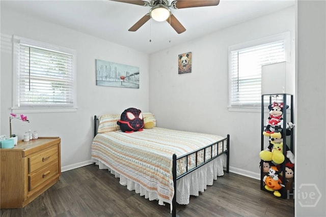 1504 Audubon Dr, Savannah, GA 31415 - bedroom featuring dark wood-style floors, baseboards, and a ceiling fan
