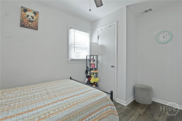 1504 Audubon Dr, Savannah, GA 31415 - bedroom featuring dark wood-style floors, baseboards, and a ceiling fan