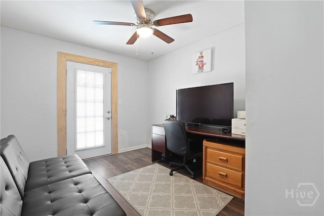 1504 Audubon Dr, Savannah, GA 31415 - office with dark wood-style floors, a ceiling fan, and baseboards