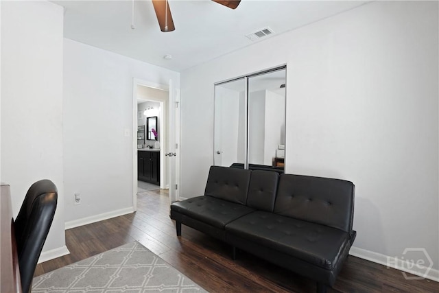 1504 Audubon Dr, Savannah, GA 31415 - living room with wood finished floors, ceiling fan, and baseboards