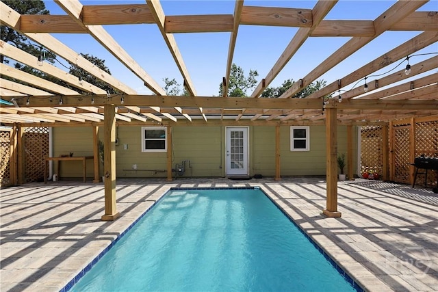 1504 Audubon Dr, Savannah, GA 31415 - outdoor pool with a pergola, a patio area, and a grill