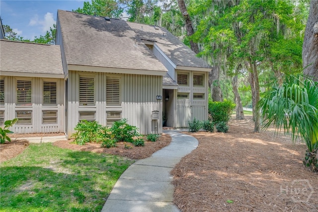 66 Dame Kathryn Dr, Savannah, GA 31411 - view of front of property with board and batten siding and roof with shingles