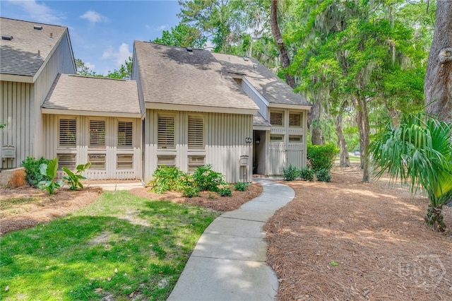66 Dame Kathryn Dr, Savannah, GA 31411 - view of front of property featuring board and batten siding and a shingled roof