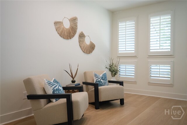 66 Dame Kathryn Dr, Savannah, GA 31411 - sitting room with wood finished floors and baseboards