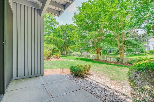 66 Dame Kathryn Dr, Savannah, GA 31411 - view of green lawn featuring a water view and a patio area