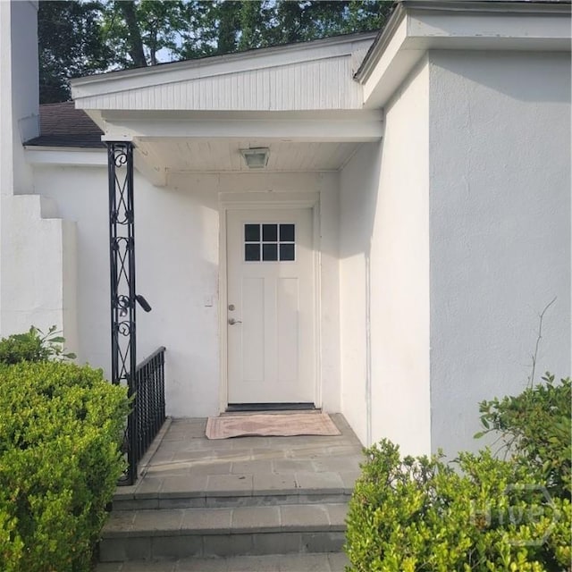 1214 Delesseps Ave, Savannah, GA 31404 - doorway to property featuring stucco siding