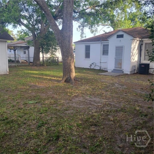 1214 Delesseps Ave, Savannah, GA 31404 - back of property featuring central AC and stucco siding