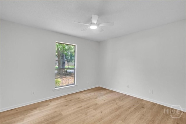 28 Red Fox Dr, Savannah, GA 31419 - empty room with light wood-type flooring, a ceiling fan, and baseboards