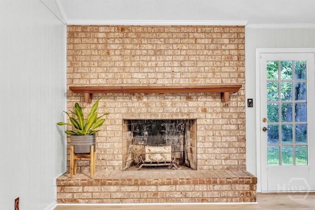 28 Red Fox Dr, Savannah, GA 31419 - detailed view of crown molding, wood finished floors, and a fireplace