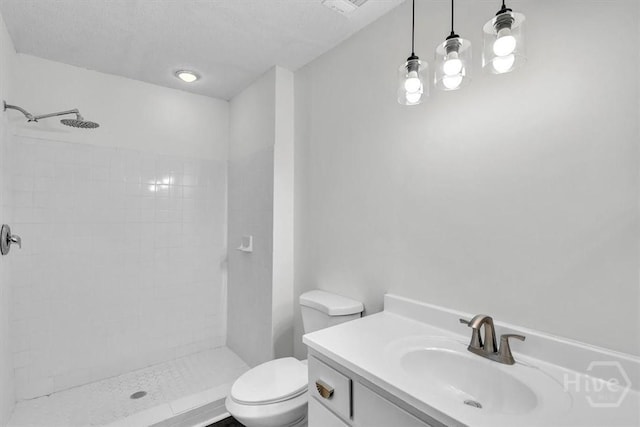 28 Red Fox Dr, Savannah, GA 31419 - bathroom with toilet, tiled shower, and vanity
