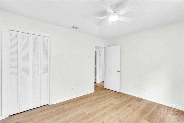 28 Red Fox Dr, Savannah, GA 31419 - unfurnished bedroom with light wood-type flooring, baseboards, a closet, and ceiling fan