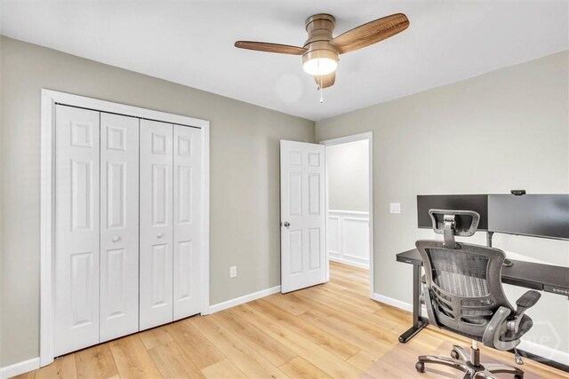 150 Laurenburg Dr, Richmond Hill, GA 31324 - home office featuring ceiling fan, light wood finished floors, and baseboards