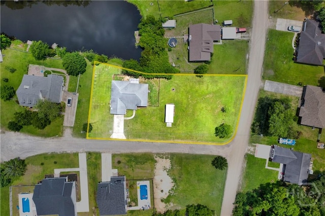 29 Joy Ln, Midway, GA 31320 - aerial perspective of suburban area with property parcel outlined and a large body of water