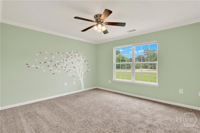 29 Joy Ln, Midway, GA 31320 - empty room featuring carpet floors, ornamental molding, baseboards, and ceiling fan