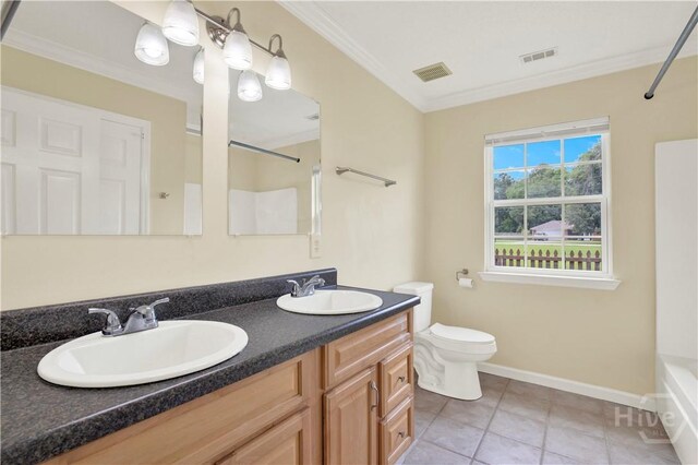 29 Joy Ln, Midway, GA 31320 - bathroom with double vanity, toilet, crown molding, tile patterned floors, and shower / bathtub combination