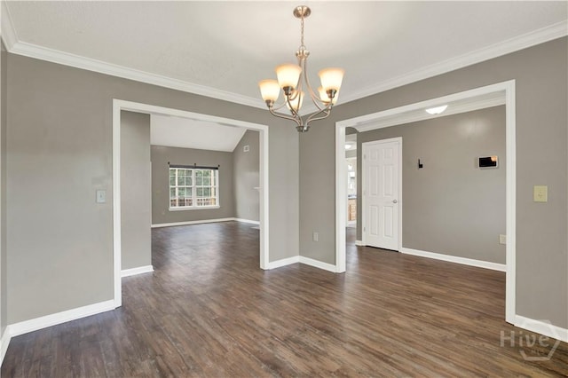 29 Joy Ln, Midway, GA 31320 - spare room with a chandelier, dark wood finished floors, baseboards, and ornamental molding