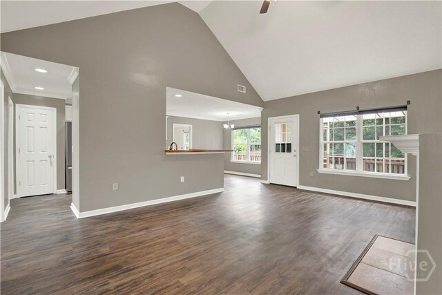 29 Joy Ln, Midway, GA 31320 - unfurnished living room featuring high vaulted ceiling, baseboards, dark wood-type flooring, ceiling fan, and recessed lighting