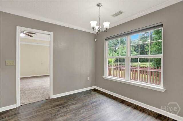 29 Joy Ln, Midway, GA 31320 - unfurnished room with a chandelier, ornamental molding, baseboards, dark wood finished floors, and ceiling fan