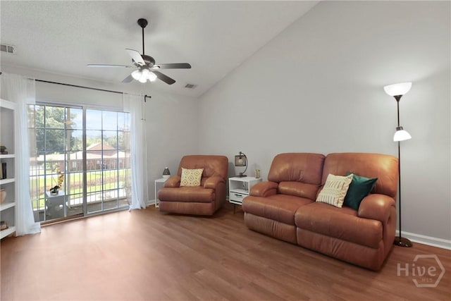 310 Tibet Ave Unit 10, Savannah, GA 31406 - living area featuring ceiling fan, wood finished floors, lofted ceiling, and baseboards
