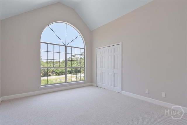 98 Picket Row, Savannah, GA 31410 - unfurnished bedroom with carpet floors, lofted ceiling, baseboards, and a closet