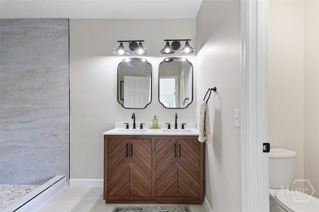 98 Picket Row, Savannah, GA 31410 - bathroom featuring double vanity, toilet, tile patterned floors, a shower, and baseboards